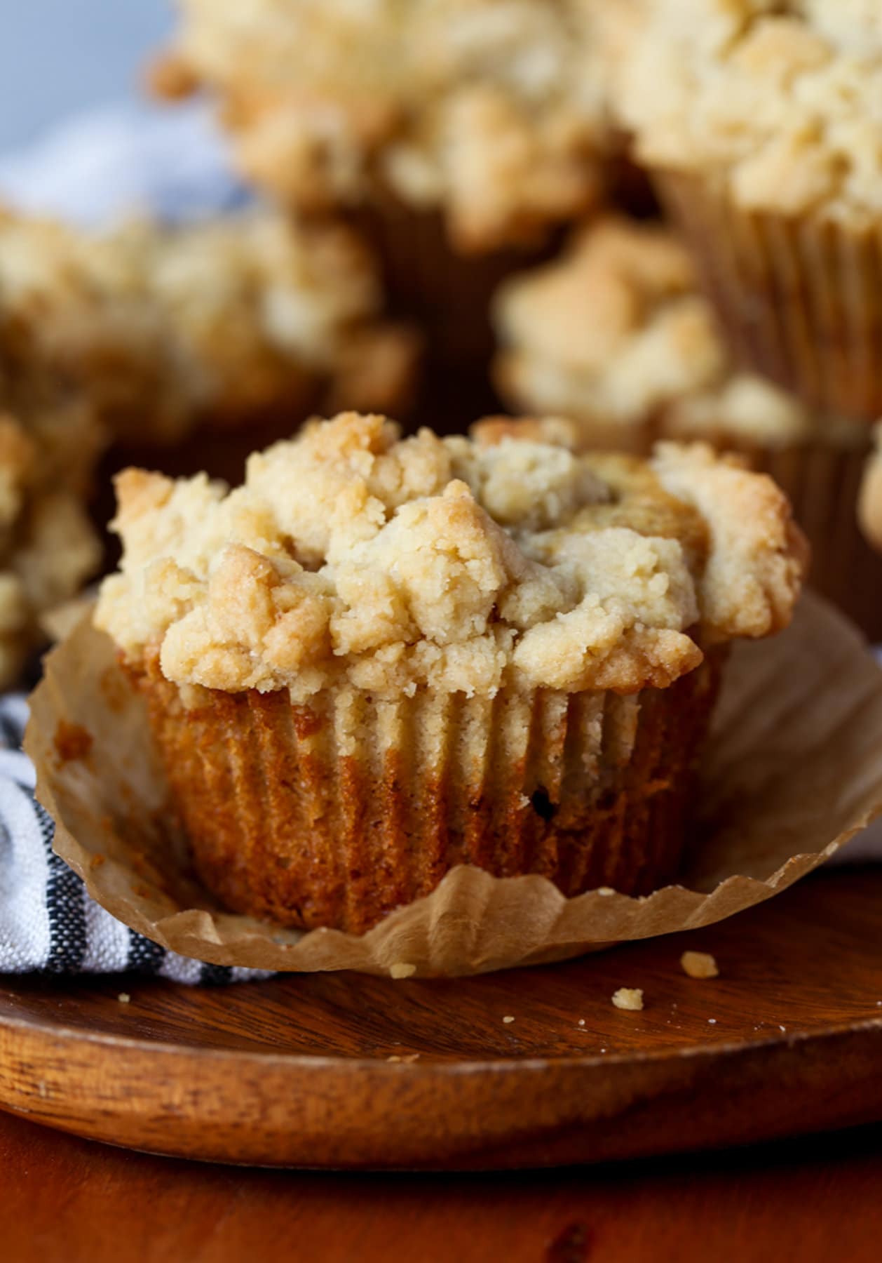 A banana muffin with the liner removed.