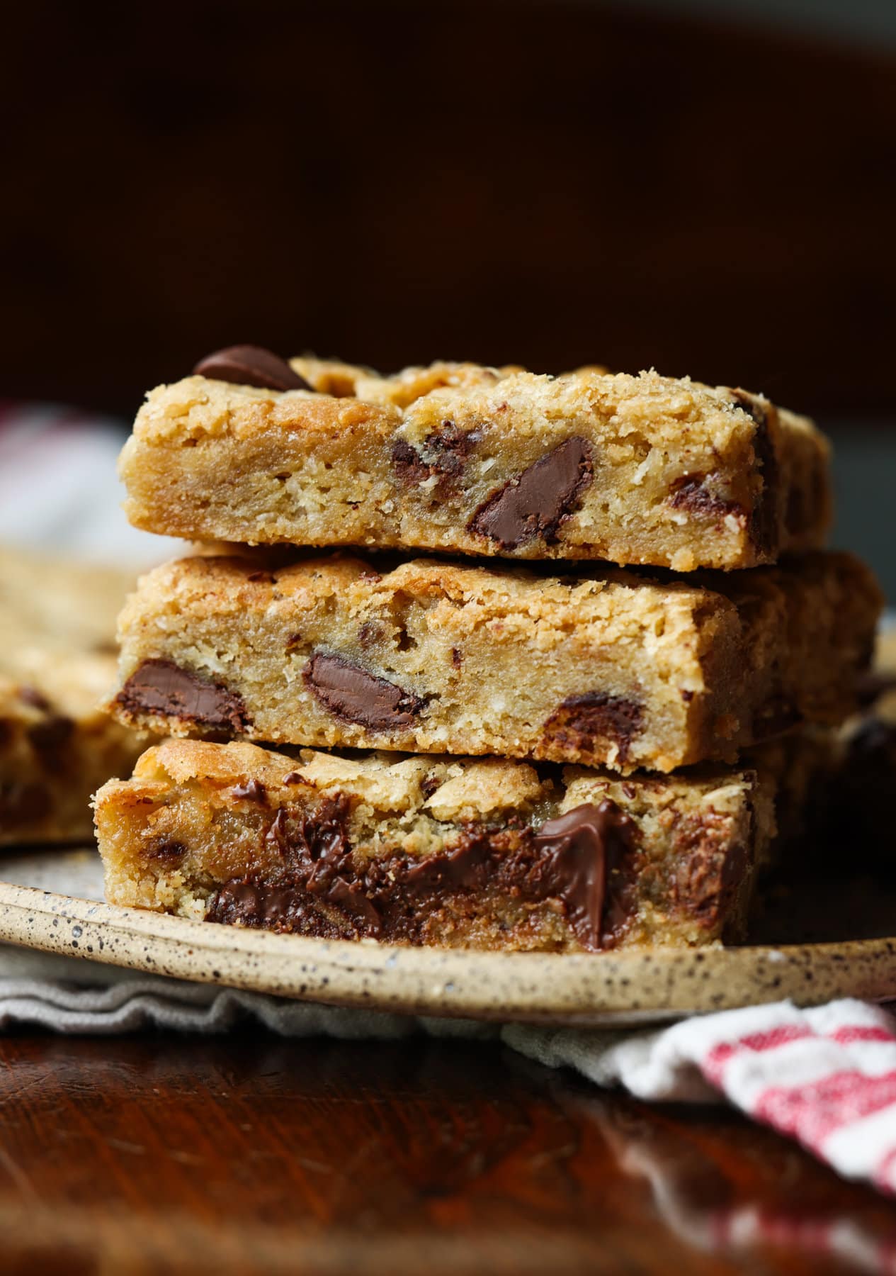 3 stacked blondie cookie bars on a plate