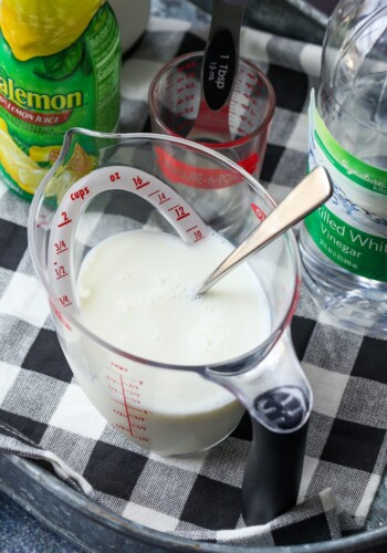 Homemade buttermilk in a measuring cup