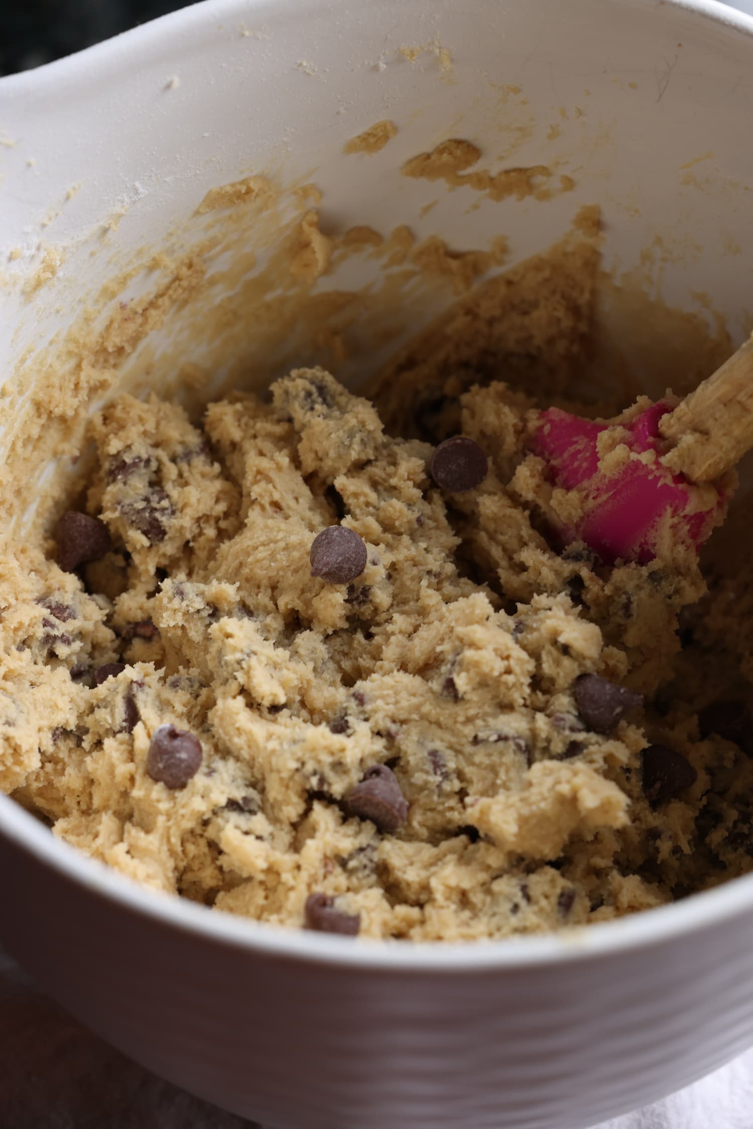 chocolate chip cookie dough in a mixing bowl