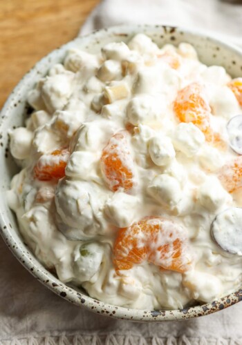 frog eye salad in a bowl with mandarin oranges