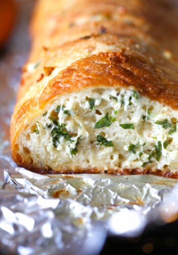 This Epic Stuffed Garlic Bread is the best you will ever make...it's buttery, cheesy and LOADED with fresh garlic!