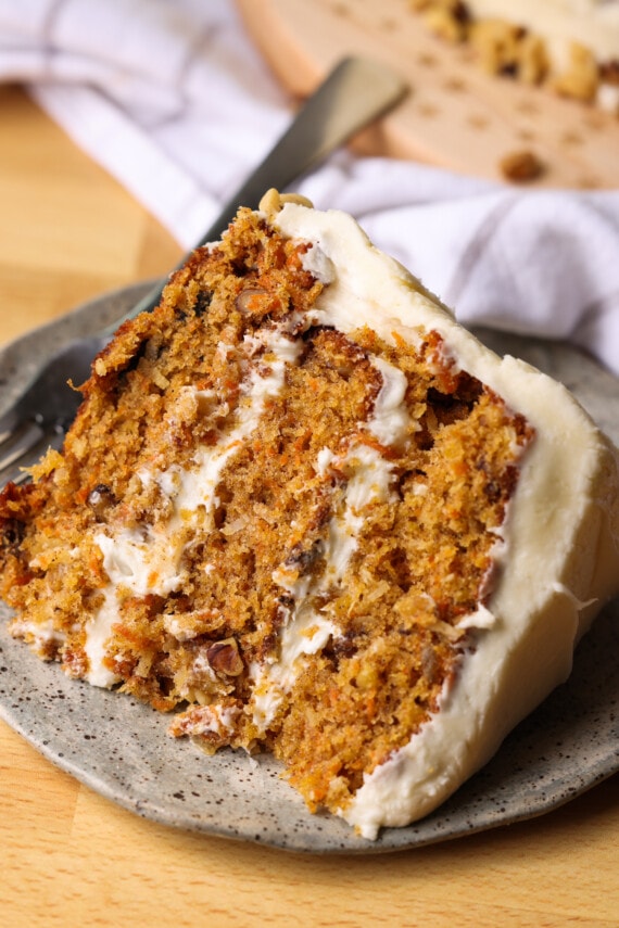 a slice of carrot cake on a plate