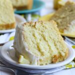 A slice of lemon chiffon cake on a plate.