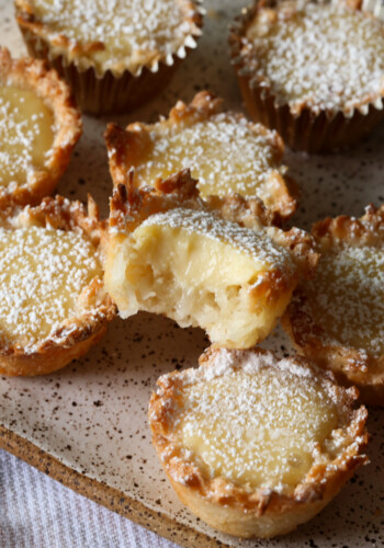 Lemon Coconut Tassies with a bite taken out