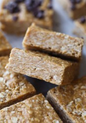 No Bake Oat Squares cut and stacked on parchment paper