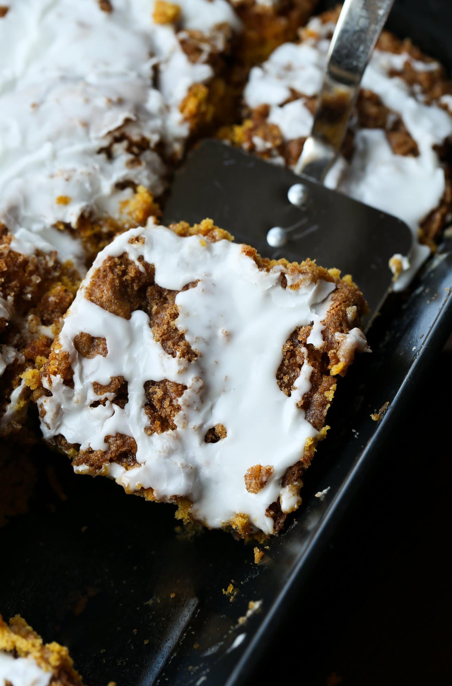 pumpkin cake on a spatula being served