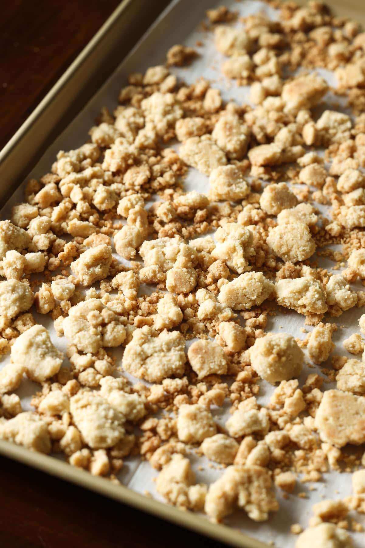 Streusel Topping baked on a parchment lined baking sheet